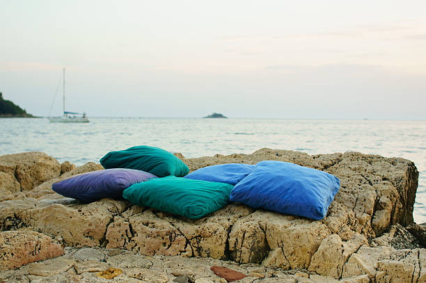 colorful pillows on the rocks