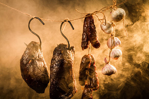 istock Ham, sausage and garlic in a smokehouse 460137863