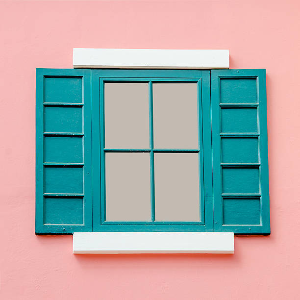 istock Vintage window on pink wall background 460139045