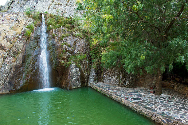 istock River Beach with Waterfall, Penha Garcia, Portugal 460139057