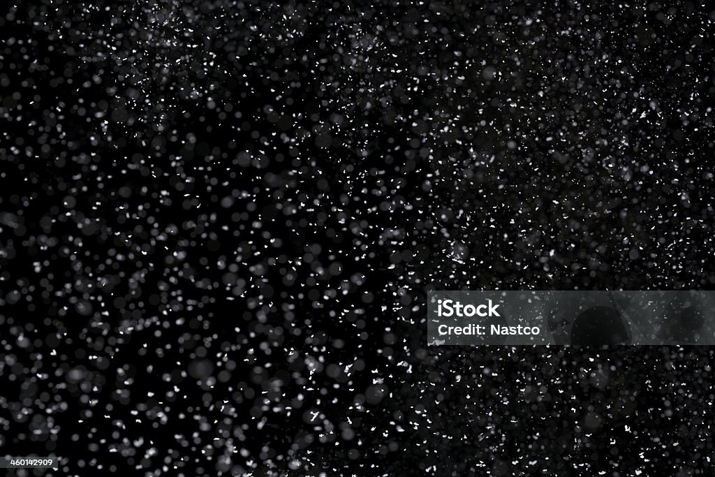 Snow isolated on black background Falling snow over black background with copy space Black Background Stock Photo
