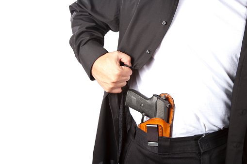 Example of concealed carry. Shot against a white background.