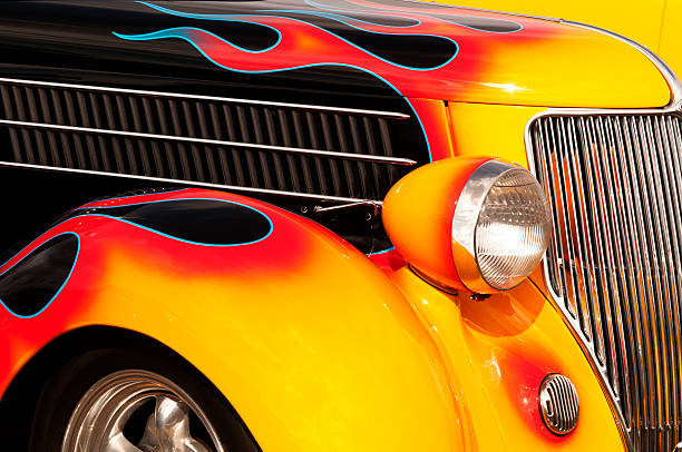 Flames and Chrome Hot Rod Chrome and flame details on a vintage Hot Rod. hot rod car stock pictures, royalty-free photos & images