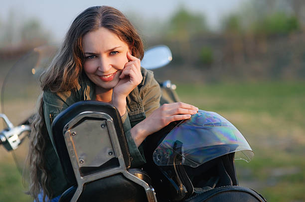 istock girl on a motorbike 460158779