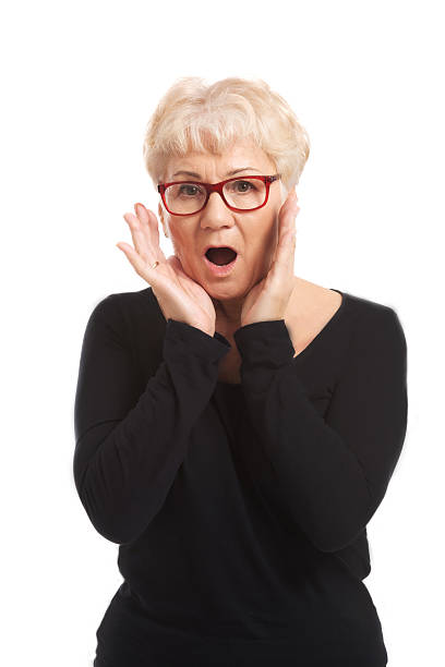 An old lady expresses shock/ surprise. stock photo