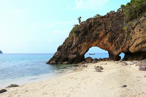 istock Nature stone arch at Ko Khai island 460159103