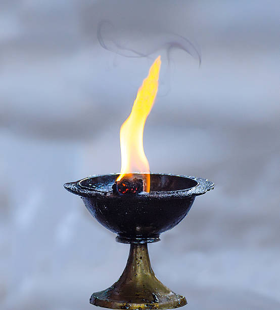 istock Candle in candlestick for worship genesha 460175331