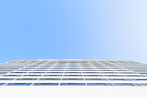 istock skyscraper against sky building glass background 460180517