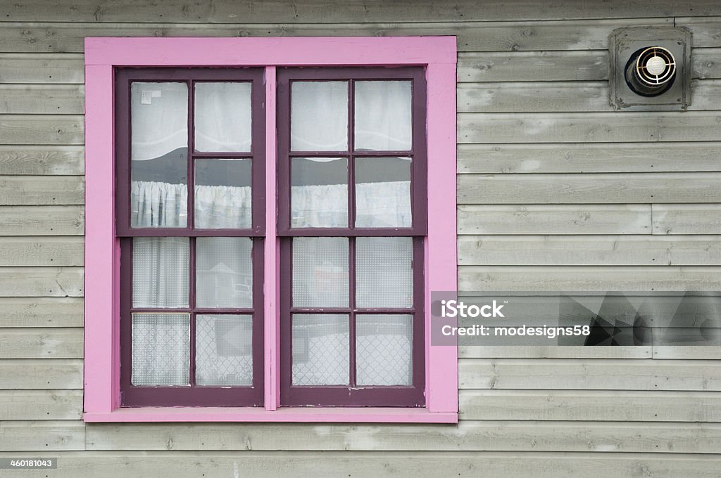 Pink Window Frame A wooden window frame painted bright pink. Architecture Stock Photo