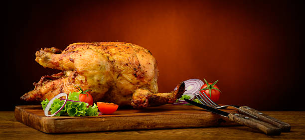 istock grilled chicken on a wooden plate 460200345