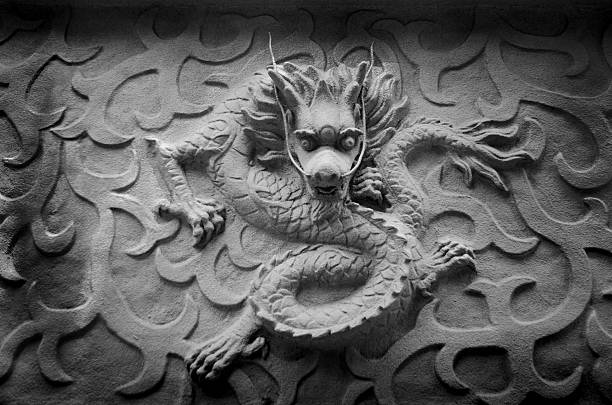 chinese stone dragon statue stock photo