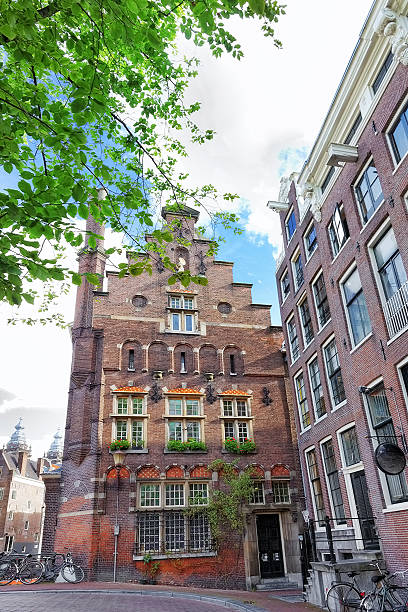 istock Amsterdam and typical houses with clear summer sky.Netherlands 460211025