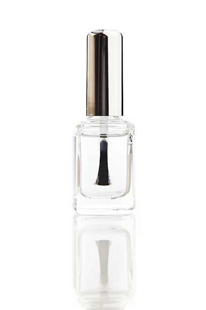 cristalino - nail polish isolated cosmetics bottle - fotografias e filmes do acervo