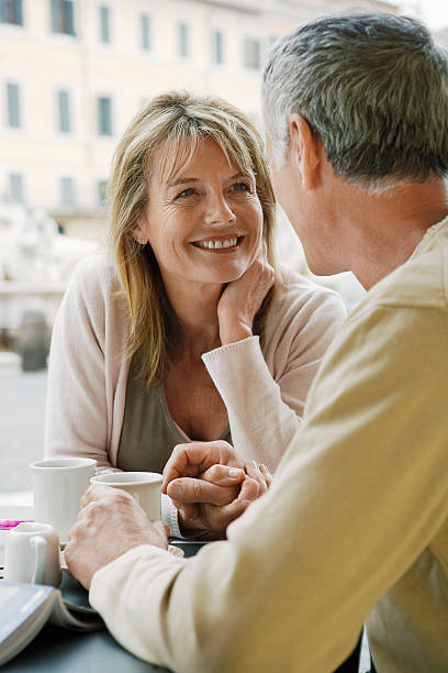 istock Couple Looking At Each Other in Outdoor Cafe 460211593