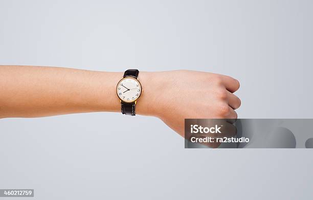 Hand With Watch Showing Precise Time Stock Photo - Download Image Now - Wrist, Businessman, Checking the Time