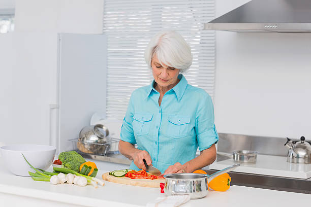 istock Woman preparing the dinner 460213273