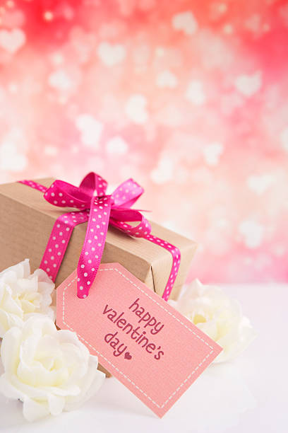 istock Valentine's gift and roses with a bright glittering background 460223557