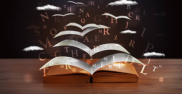istock Pages and glowing letters flying out of a book 460227953