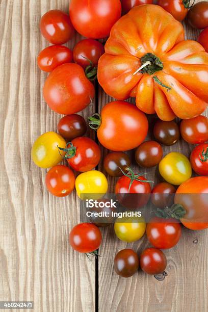 Tomatoes Stock Photo - Download Image Now - Backgrounds, Beefsteak Tomato, Black Color