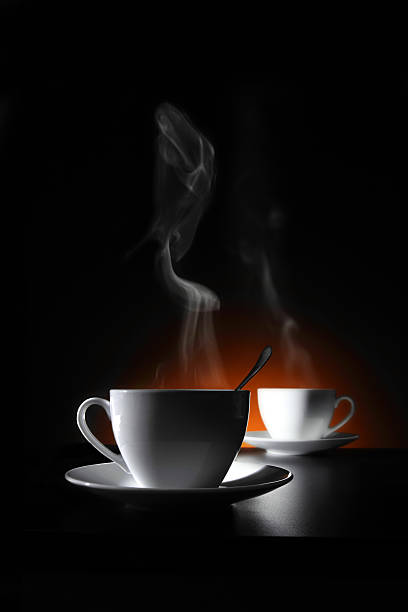 Two cups with hot coffee