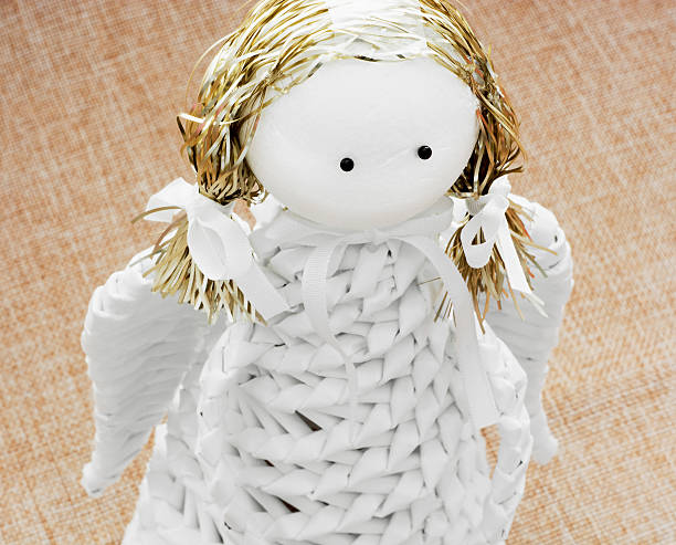 istock Closeup of a white decorative paper angel 460243339
