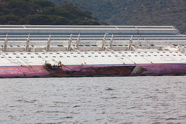 Giglio, Italy - April 28, 2012: Costa Concordia Cruise Ship at Italian Giglio Island Coastline after Shipwreck at January, 13, 2012