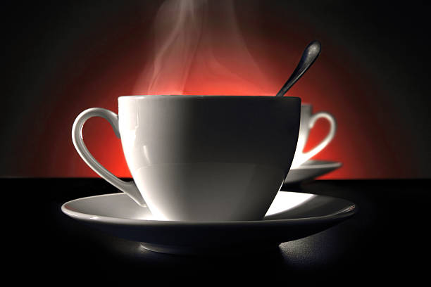 Coffee cups on red background