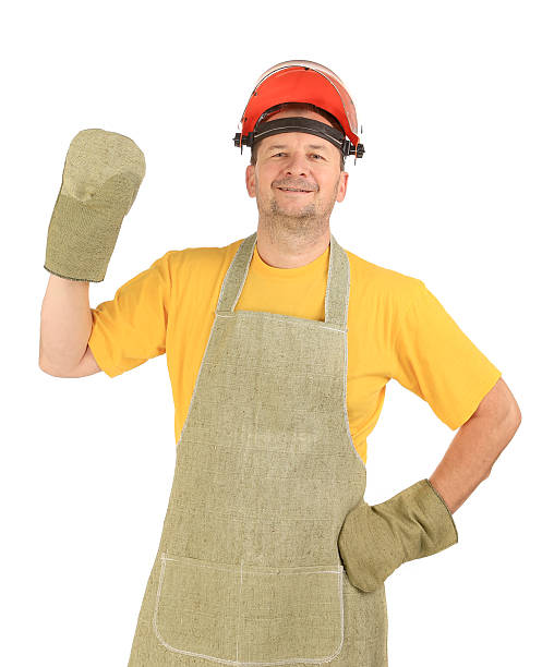 istock Welder in gloves and apron. 460244165