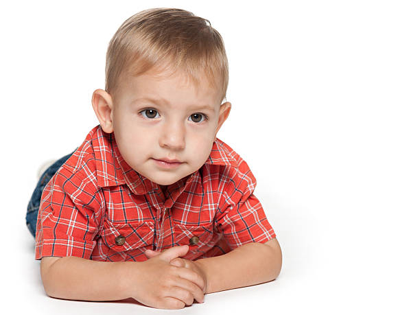 istock Smiling toddler boy in red 460244467
