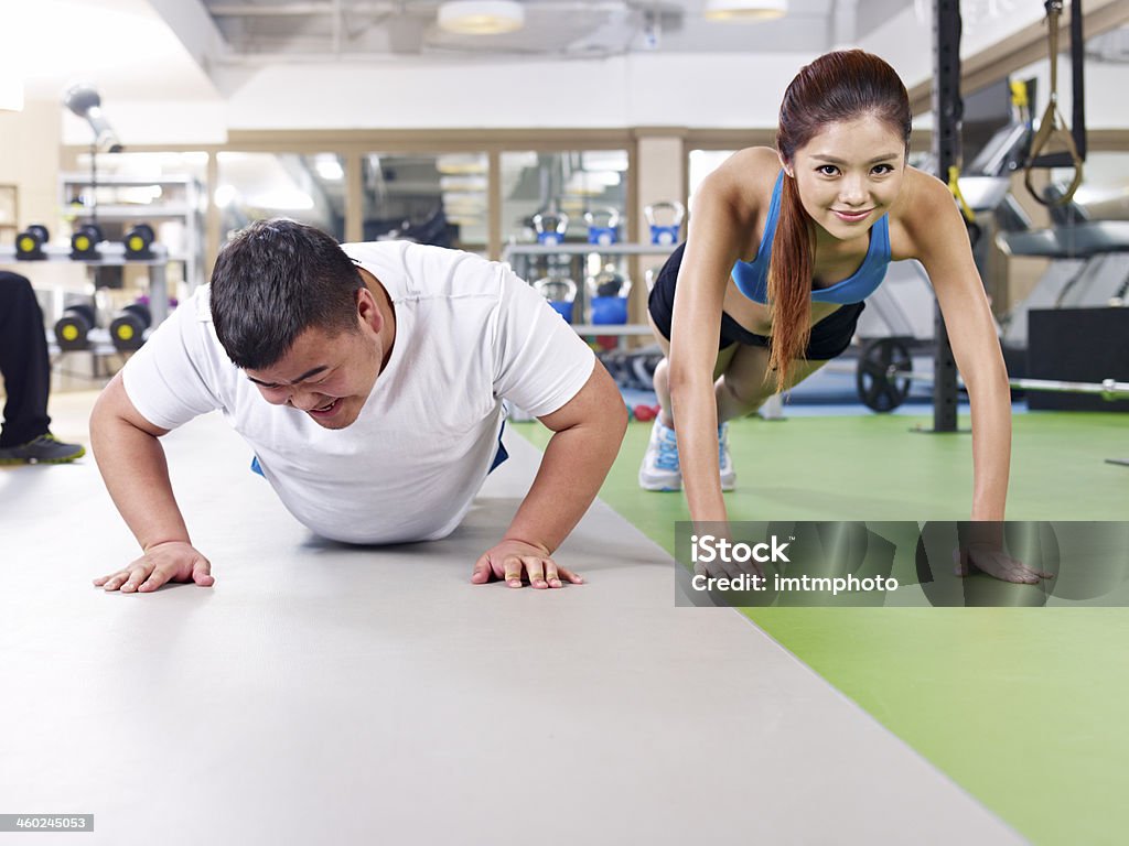 Personas hombre ejercicio - Foto de stock de Gordo - Complexión libre de derechos