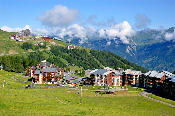 La Plagne in french Alps Mountain village of La Plagne in the French Alps, commune in the Tarentaise Valley, Savoie department and Rhône-Alpes region, in France la plagne photos stock pictures, royalty-free photos & images