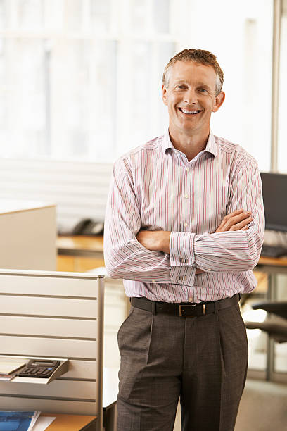 istock Smiling Businessman In Office 460249191