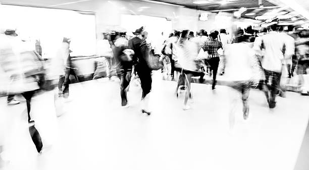 istock black and white blur passenger walk at subway station 460249563