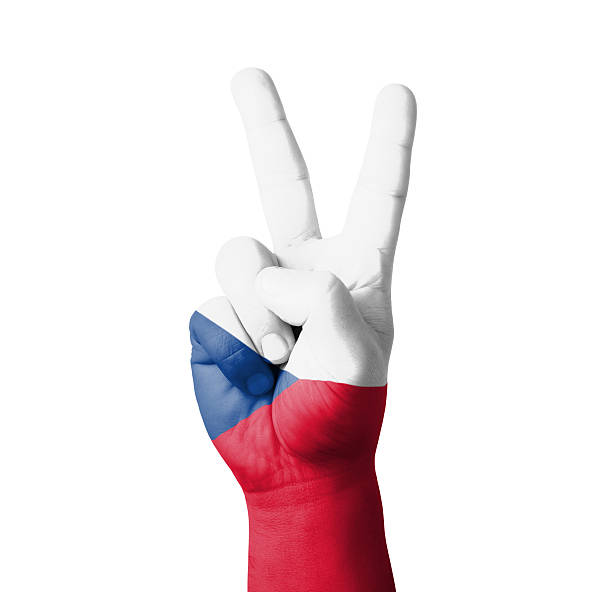 Hand making the V sign, Czech flag painted