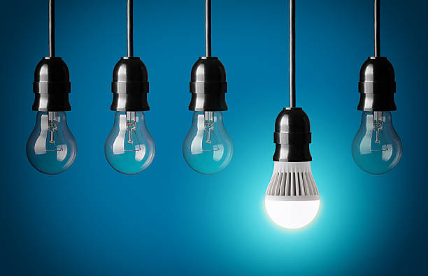 istock LED light bulb with traditional glass bulbs 460254115