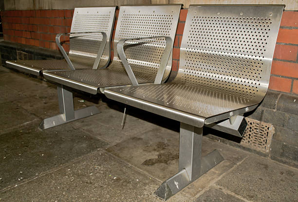 istock Metalic benches at the station 460256345