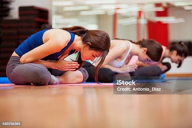 Young Women Meditating During Yoga Stock Photo - Download Image Now - 20-29 Years, Active Lifestyle, Activity