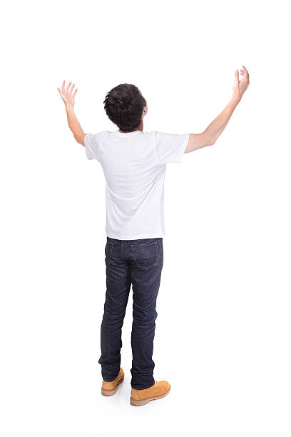istock young man carefree outstretched arms 460256589