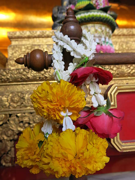 istock garlands for showing respect to Buddhist statue 460256997