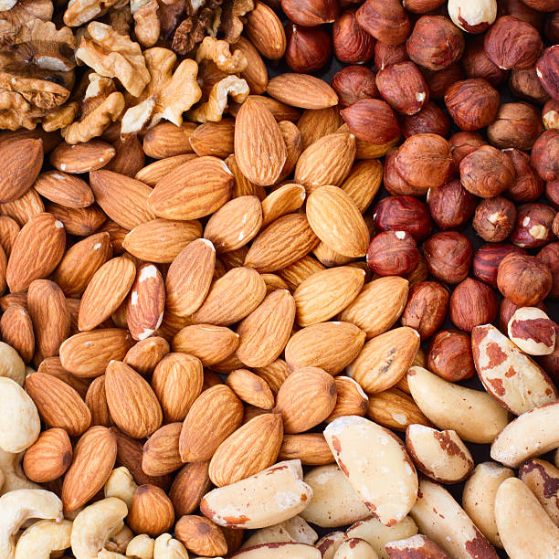 istock Hazelnuts, filbert on old wooden background 460262833
