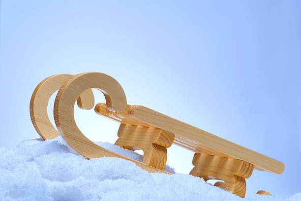 Wooden toy sled stock photo