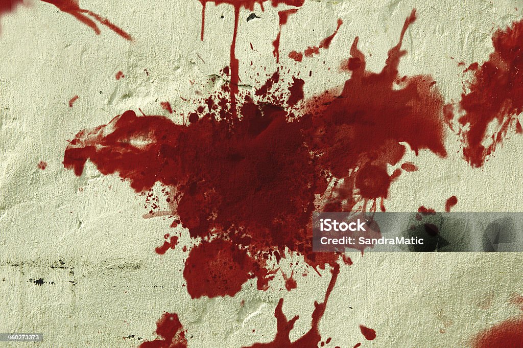 Red blood splatter on a wall. Red blood splatter on a grunge wall. Blood Stock Photo