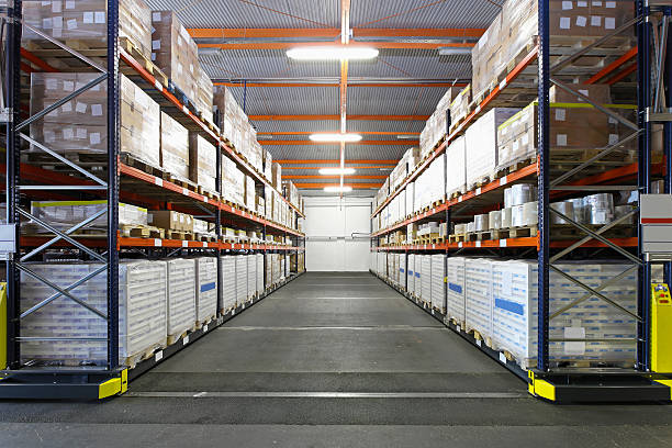 istock View down the aisle of a large storage room 460273601