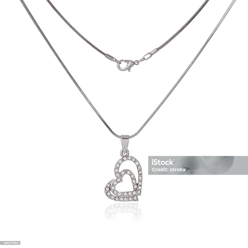 Catena argento e il pendente in forma di cuore - Foto stock royalty-free di Adulto