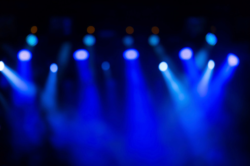 defocused stage lights/spotlights at the concert