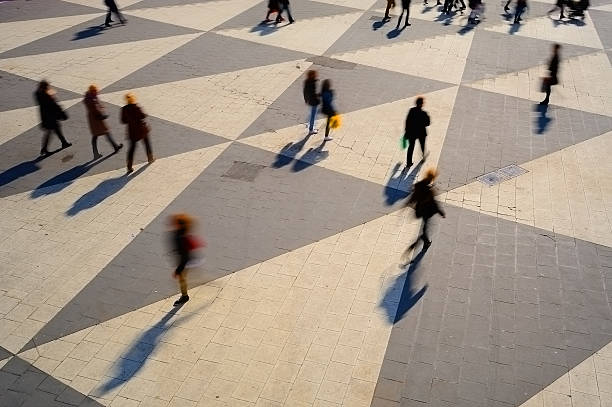 istock Shoppers on city square 460279247