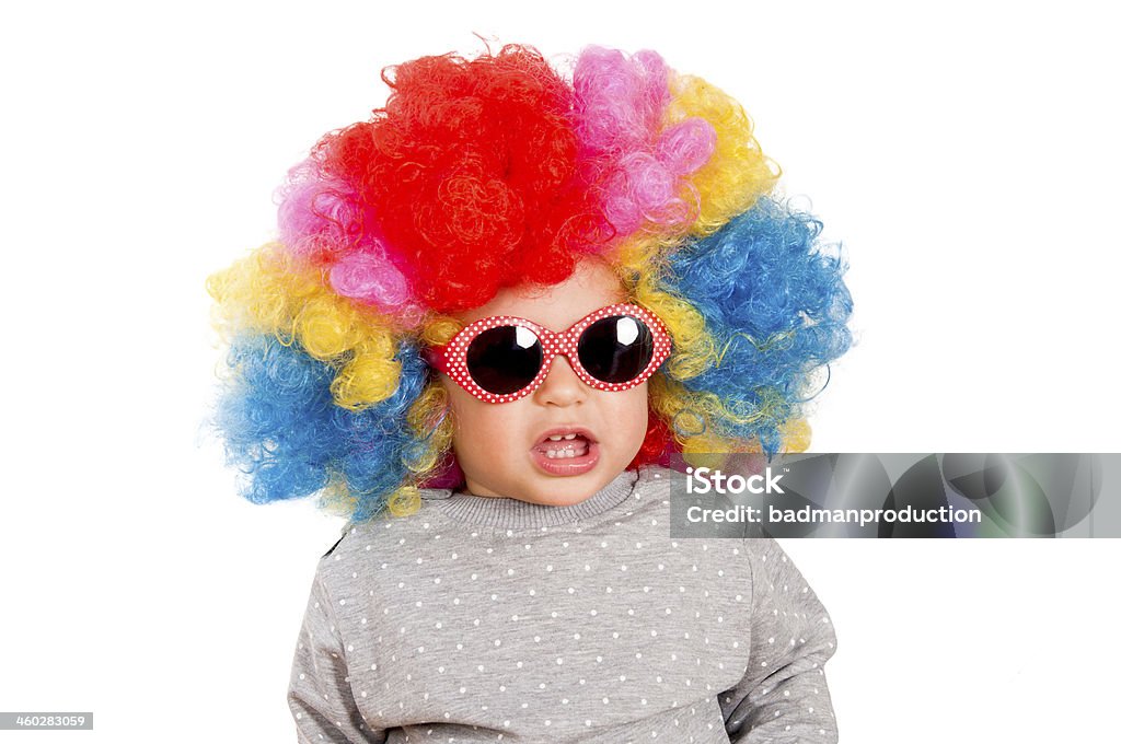 Suprised child Suprised child with clown wig and sunglasses isolated on white Baby - Human Age Stock Photo