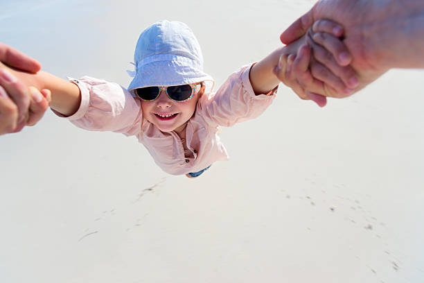 istock Father spinning his daughter 460285635