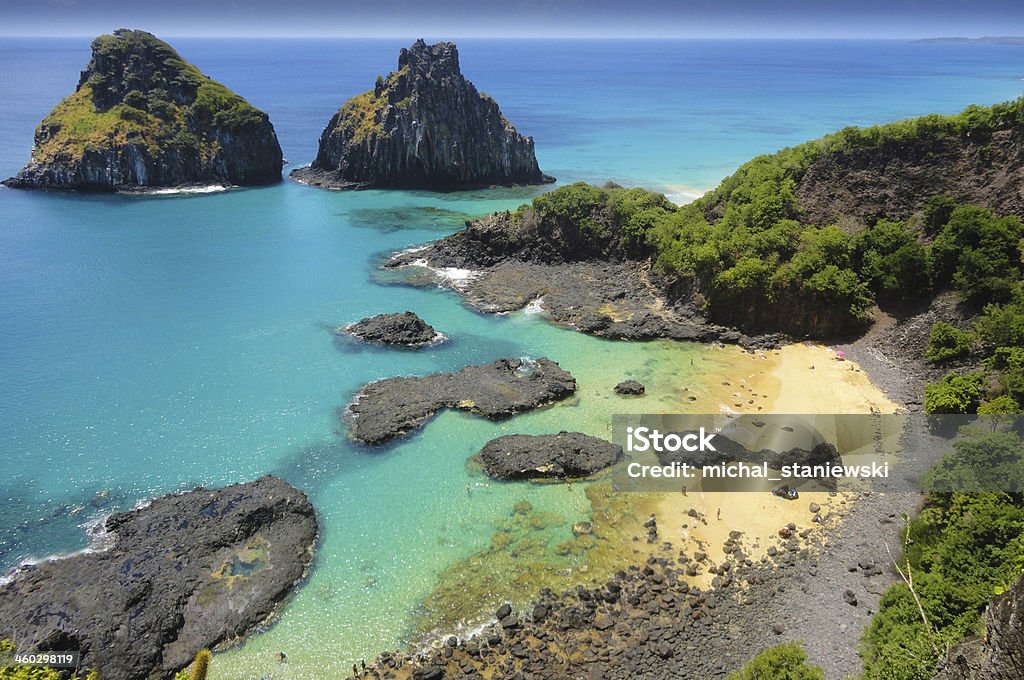 Tropical beach with a coral reef Tropical beach with a coral reef - breathtaking view Fernando De Noronha Stock Photo