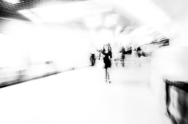 istock black and white blur passenger walk at subway station 460302051